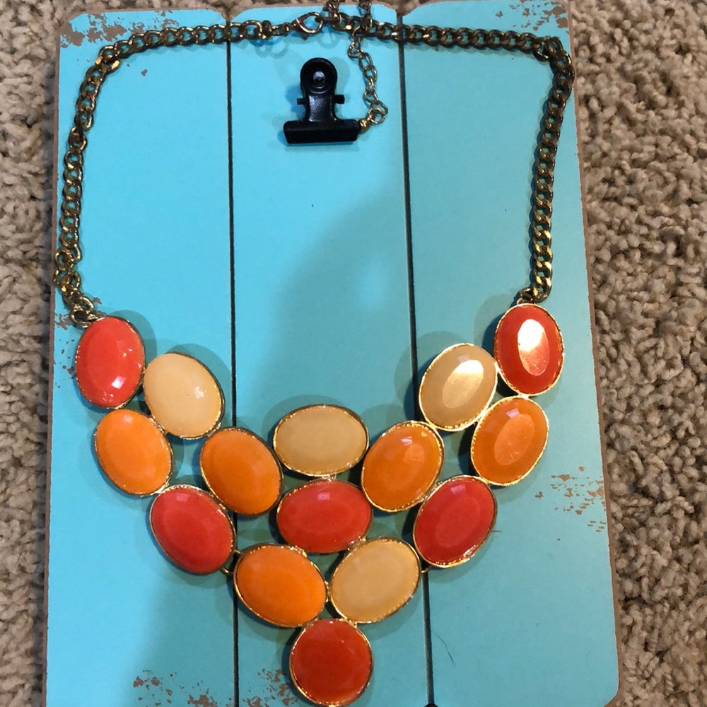 Gold and orange bib necklace.